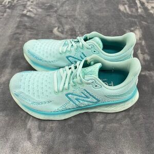Women New Balance blue & white running shoes size 8.5